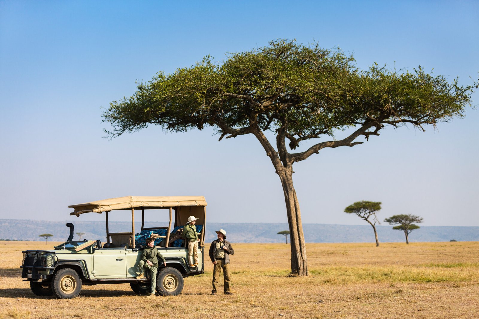 Family,Of,Father,And,Kids,On,African,Safari,Vacation,Enjoying